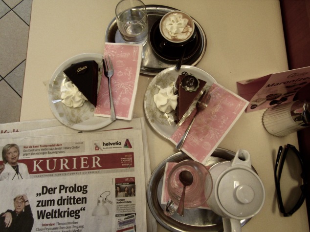 Partaking in Vienna's favorite pastime, hanging out in a cafe with some cake, coffee and a newspaper.