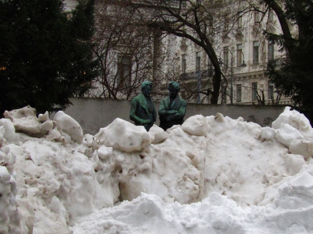 This statue of two men on the Rathaus grounds caught my eye as they appeared to be discussing what to do with the giant pile of snow in front of them.
